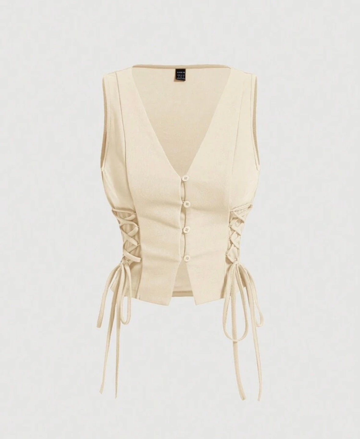 Chaleco beige amarrado
